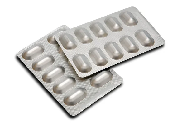 Дві упаковки сучасних таблеток — стокове фото