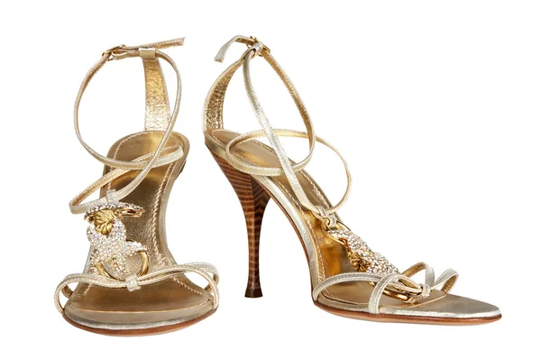 Female shoes of gold colo — Stock Photo, Image