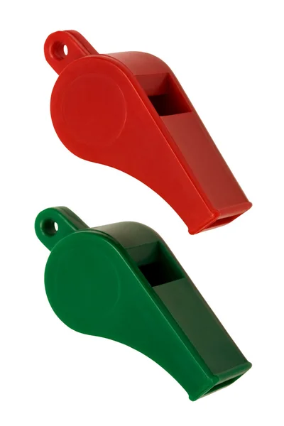 Красный и зеленый свисток — стоковое фото