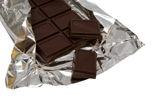 Chocolate escuro em uma folha metálica — Fotografia de Stock