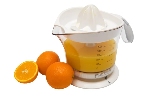 Olgun portakal ve meyve suyu extractor — Stok fotoğraf