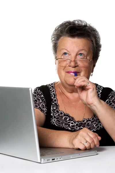Old woman with modern laptop — Stock Photo, Image