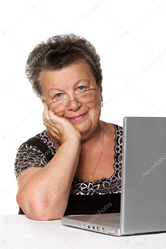 Old woman with modern laptop