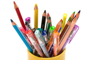 Color pencils and pens on a white background clipart