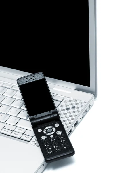 Mobiltelefon och bärbar dator — Stockfoto