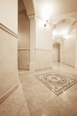 Beautiful corridor with a door in a modern apartment clipart