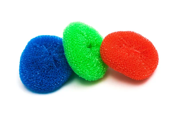 stock image Red, green and blue sponge on a white background