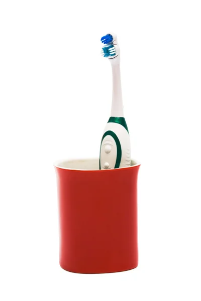 Зубная Щетка Красном Стакане Белом Фоне — стоковое фото