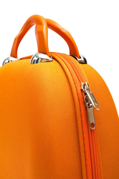 Оранжевый большой чемодан — стоковое фото