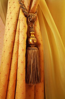 Curtain with an ornament clipart