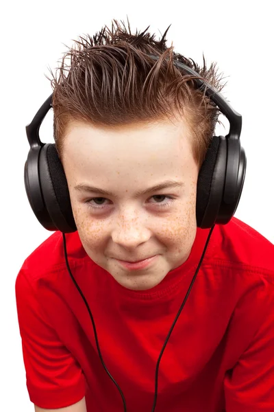 Pojke med fräkne och hörlurar — Stockfoto