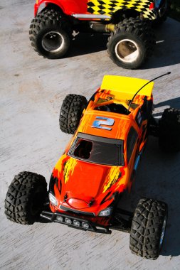 Radio-controlled model of the red car close-up clipart