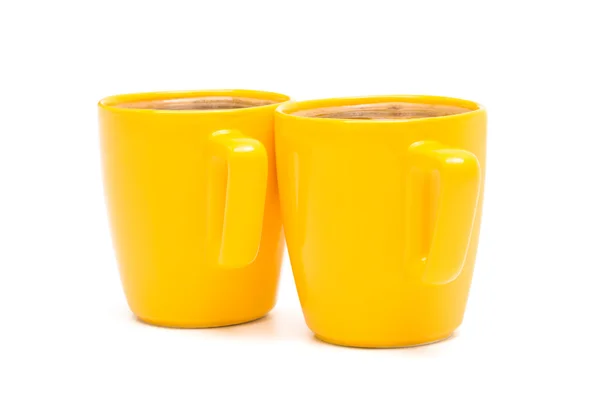 Dwa kubki żółty — Zdjęcie stockowe