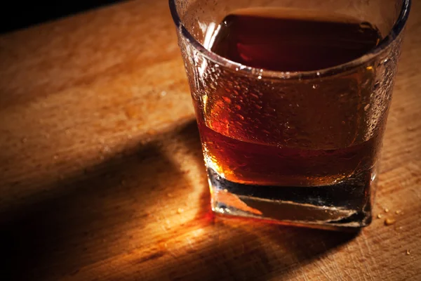 Whisky on a wooden table — Stock Photo, Image