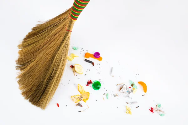 Broom sweeping various debris — Stock Photo, Image