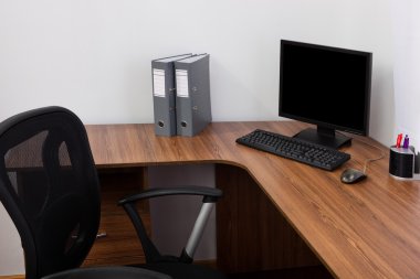 Monitor on a desk clipart