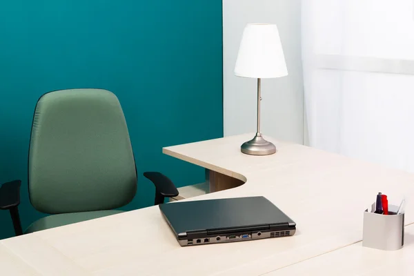 Laptop on a desk — Stock Photo, Image