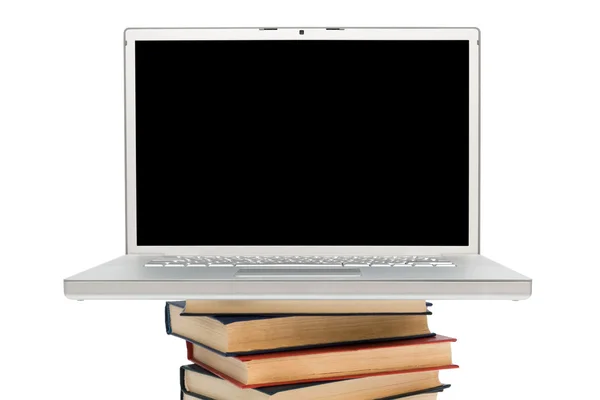 Boeken en laptop — Stockfoto