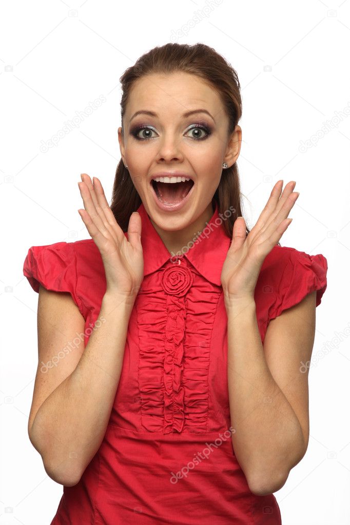 Girl in red blouse happily surprised (white background)