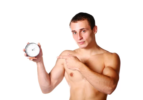 Handsome guy shirtless with clock — Stock Photo, Image