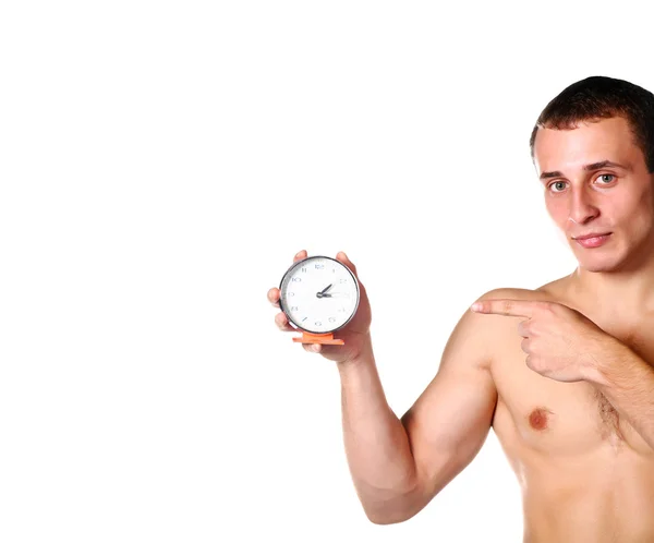 Handsome guy shirtless with clock — Stock Photo, Image