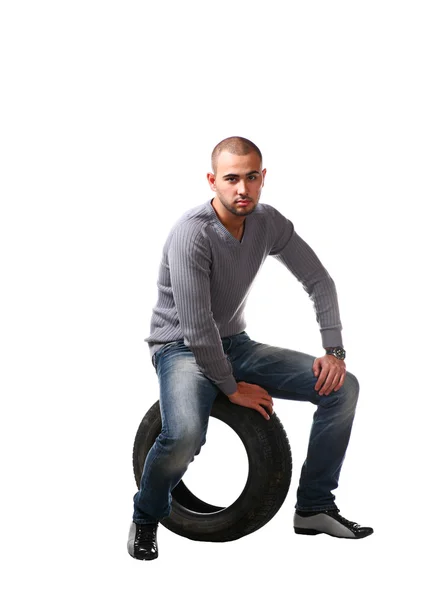 Young Latin Male Car Tyre Isolated White Background — Stock Photo, Image