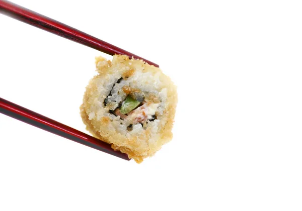 Ätpinnar Hålla Sushi Mot Ren Vit Bakgrund — Stockfoto