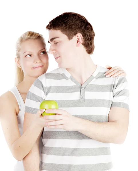 Casal jovem com maçã — Fotografia de Stock