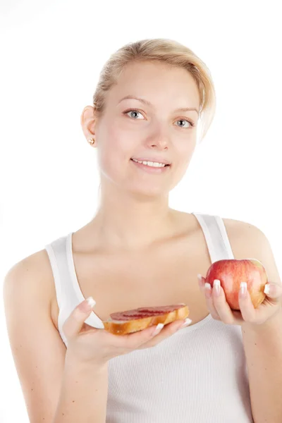 Jovem loira com maçã e sanduíche — Fotografia de Stock