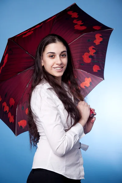 Attractive woman with umbrella — Stock Photo, Image