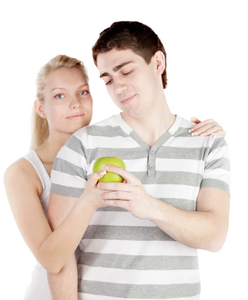 Νεαρό ζευγάρι με μήλο Εικόνα Αρχείου