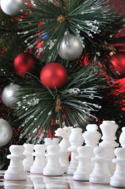 Start. White chess in Christmas decoration clipart