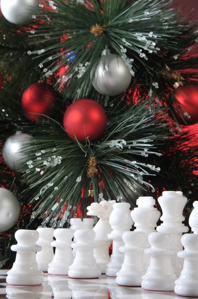 Start. White chess in Christmas decoration Royalty Free Stock Photos