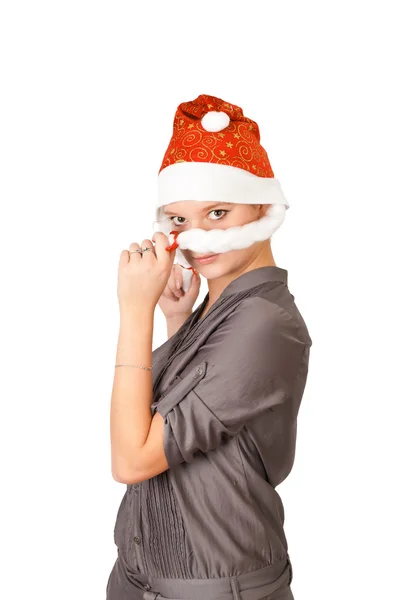 Ung kvinna i en jultomten hatt — Stockfoto