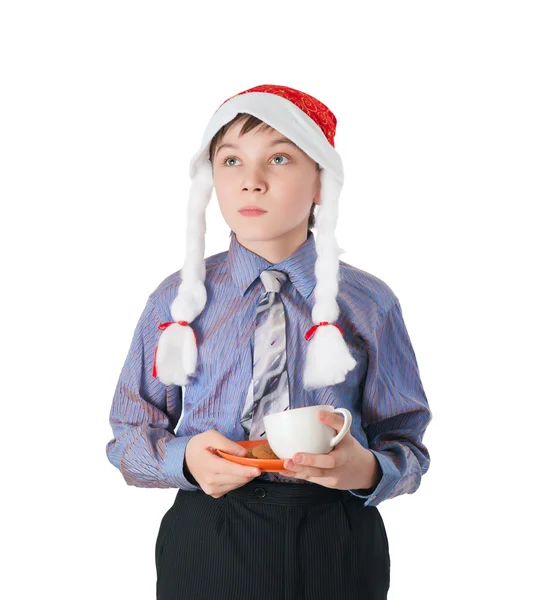 Kind mit Weihnachtsmütze — Stockfoto