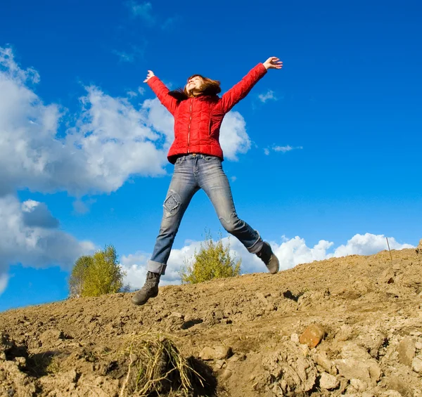 Woman jump against the sky — Stock Photo, Image
