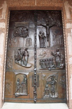 Classic Israel - Door with scenes from Bible in the Church of An clipart