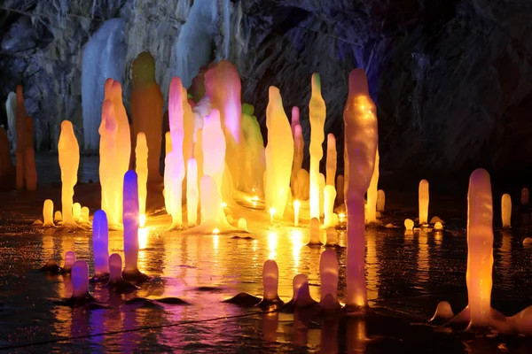 Amazing stalagmite illuminations with help candels and flash in — Stock Photo, Image
