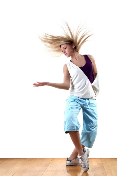 Dansçı eylem üzerinde beyaz izole — Stok fotoğraf