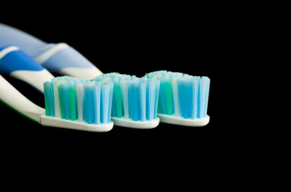 Tres cepillos de dientes —  Fotos de Stock