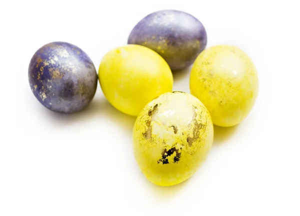 Gold and violet eggs — Stock Photo, Image