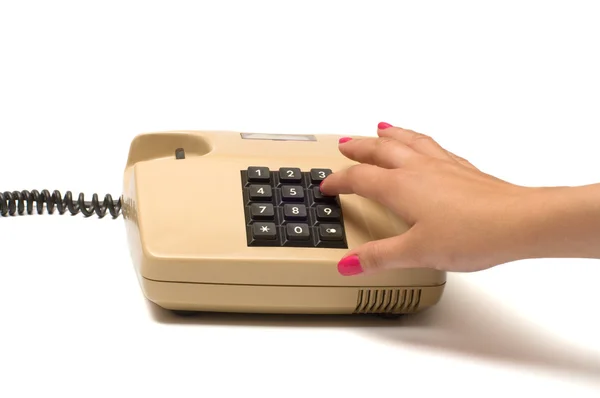 Hand and telephone. — Stock Photo, Image