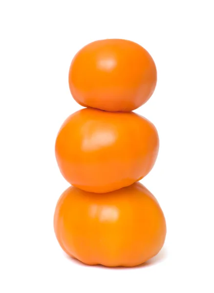 Três tomate laranja . — Fotografia de Stock