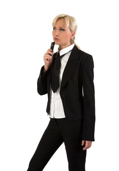 思いやりのある金髪の白い背景の上の携帯電話でビジネス スーツ — ストック写真