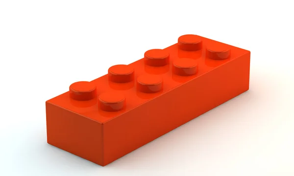 Turuncu plastik oyuncak blok — Stok fotoğraf