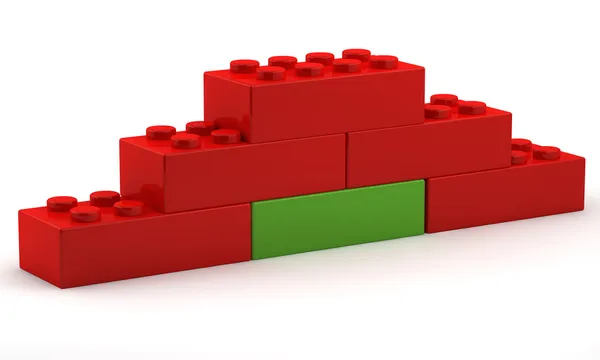 ピラミッドの基礎でユニークな赤いブロック — ストック写真