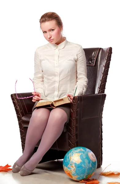 Professor sério sentado em poltrona — Fotografia de Stock