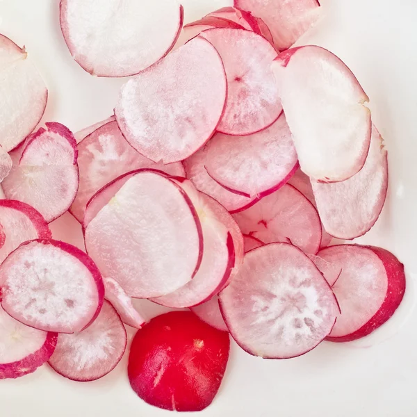 stock image Fresh radishes slices close up, healthy eating