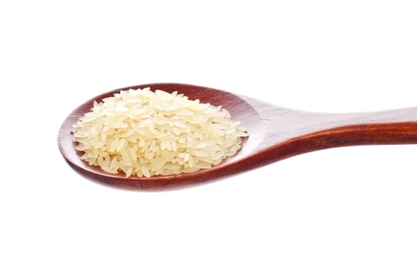 White rice in wooden spoon — Stock Photo, Image