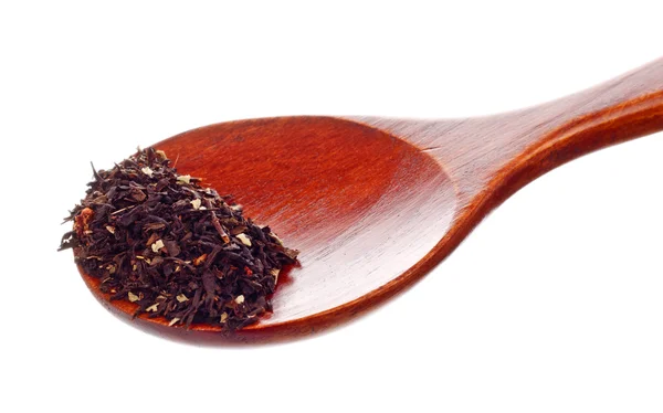 Cucchiaio di legno con tè — Foto Stock